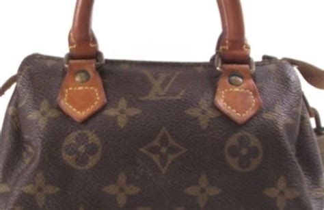 come riconoscere borsa louis vuitton originale